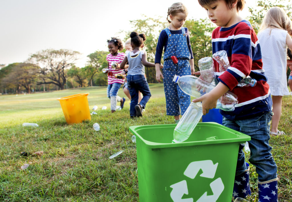 Group of kids picking up trash