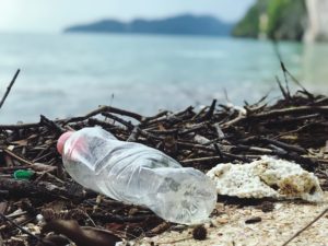 plastic water bottle on the beach