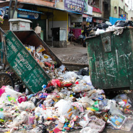 plastic pollution overflowing on street