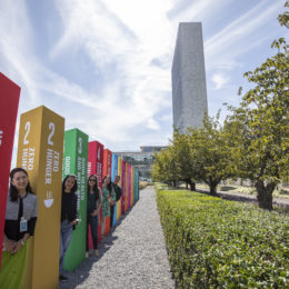 youth pose outside un headquarters in new york