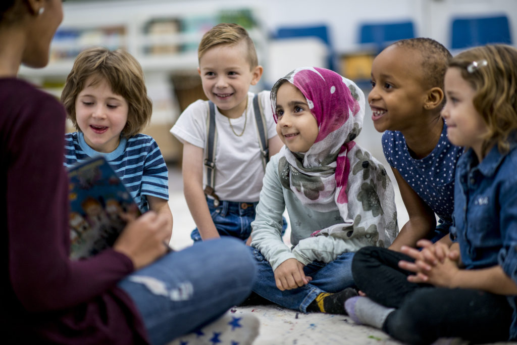 Young children learning together in the classroom