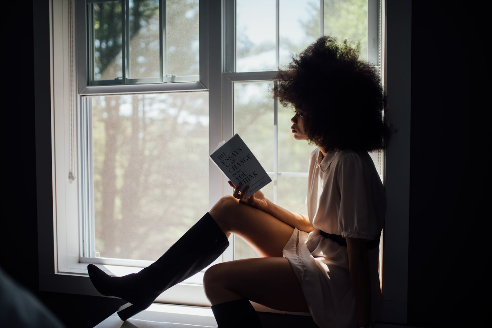 women reading in windowsill