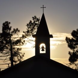 Photo of Church Bell Against Sunset
