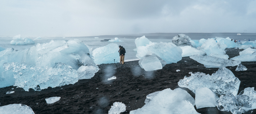 Person looking at large Ice blocks
