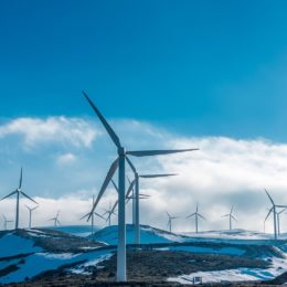 windmills on snowy ground