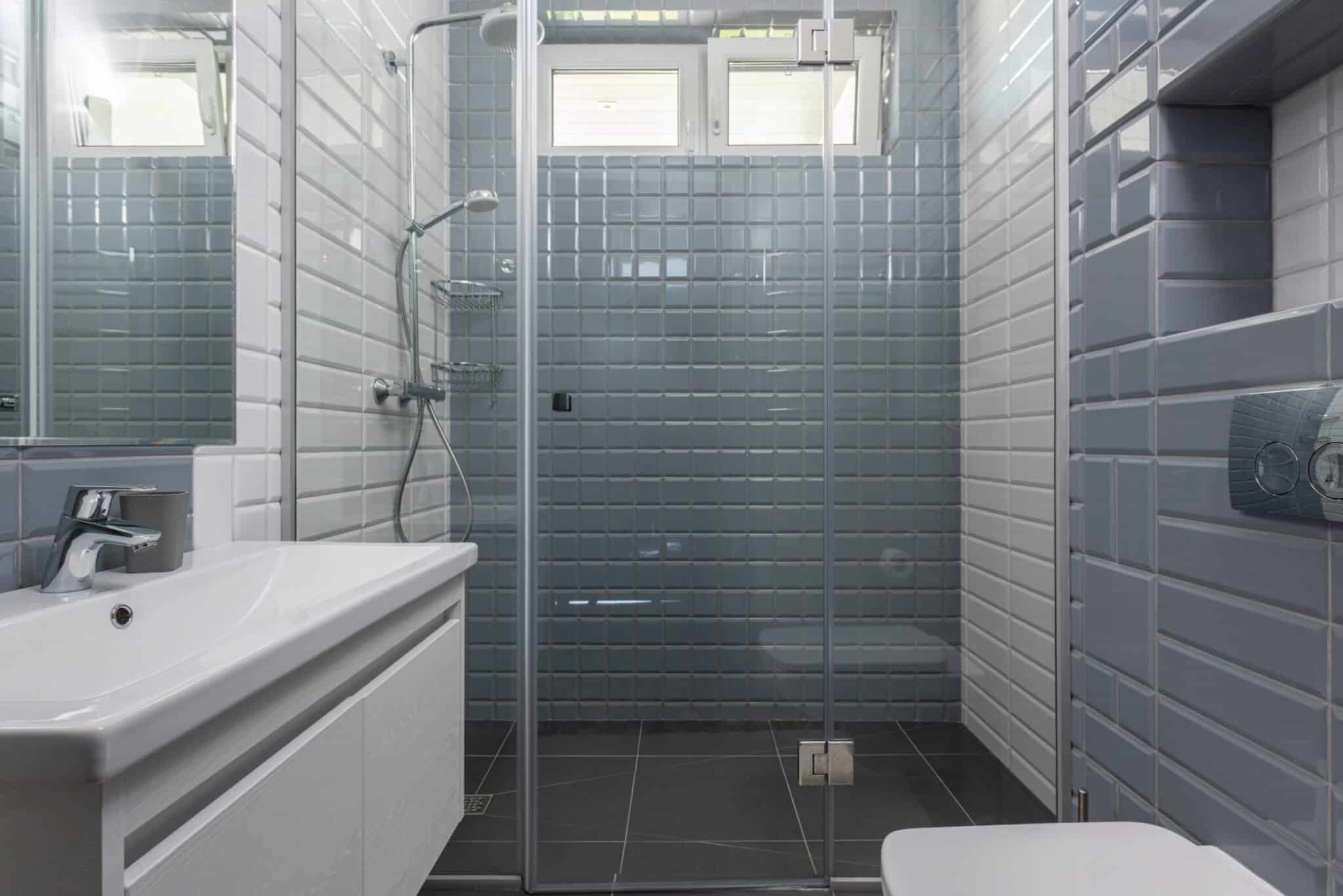 Gray and white bathroom and shower
