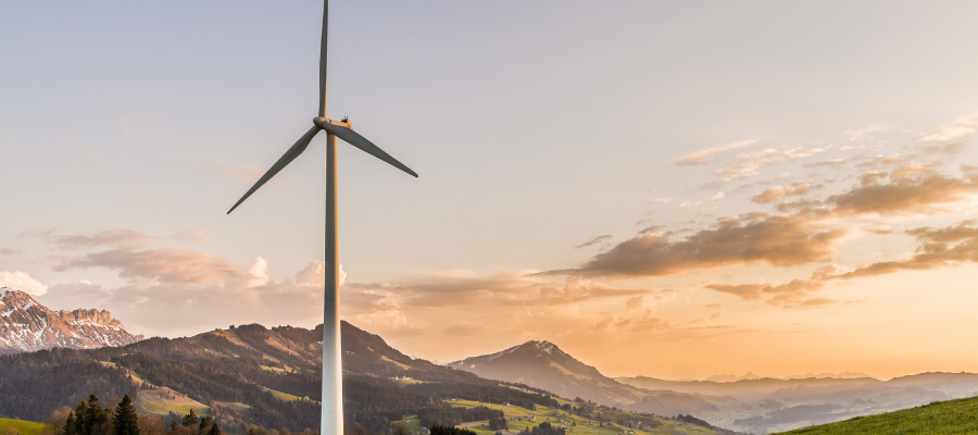 Photo of Wind Turbine on Mountain Range