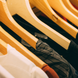 Fashion - clothes on hangers - EARTHDAY.ORG