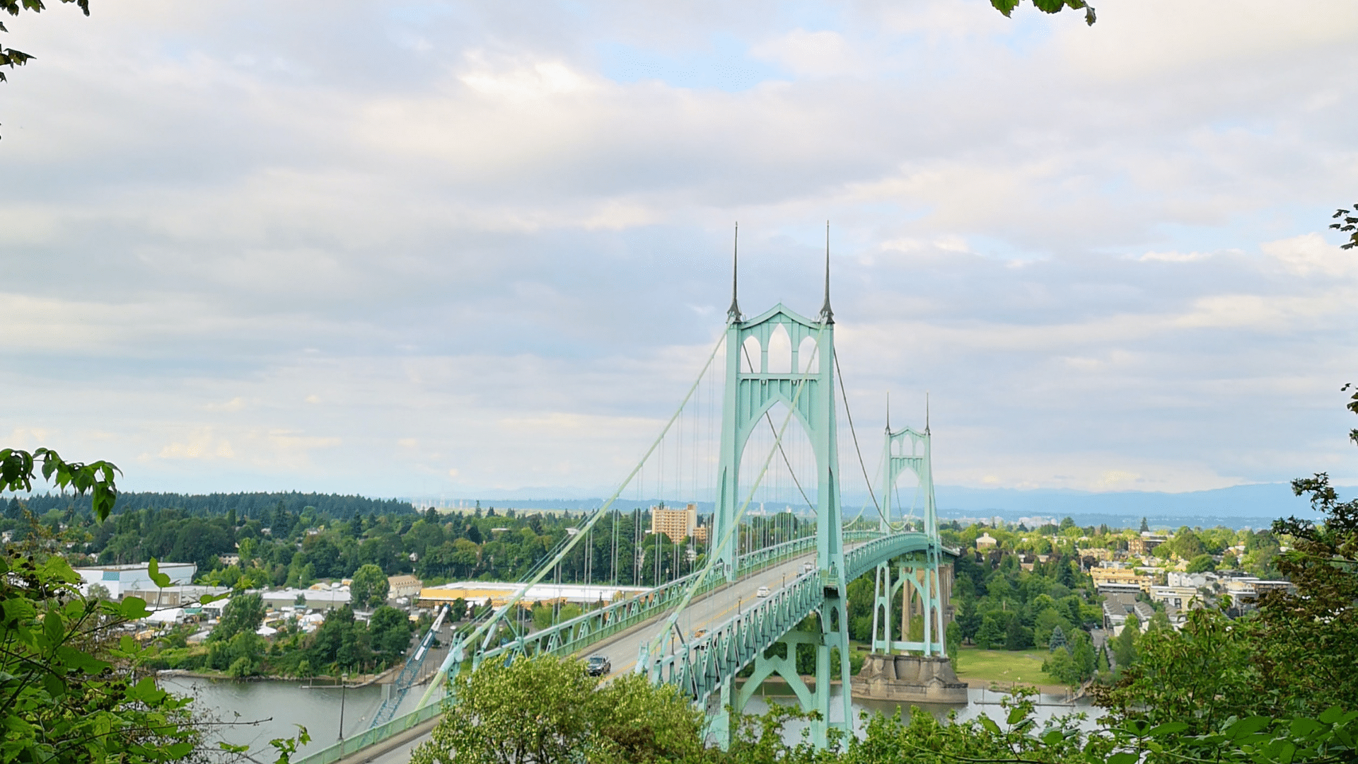 Photo of light green metal suspension bridge