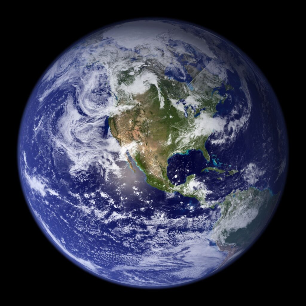 Planet Earth, centered on USA with black background.