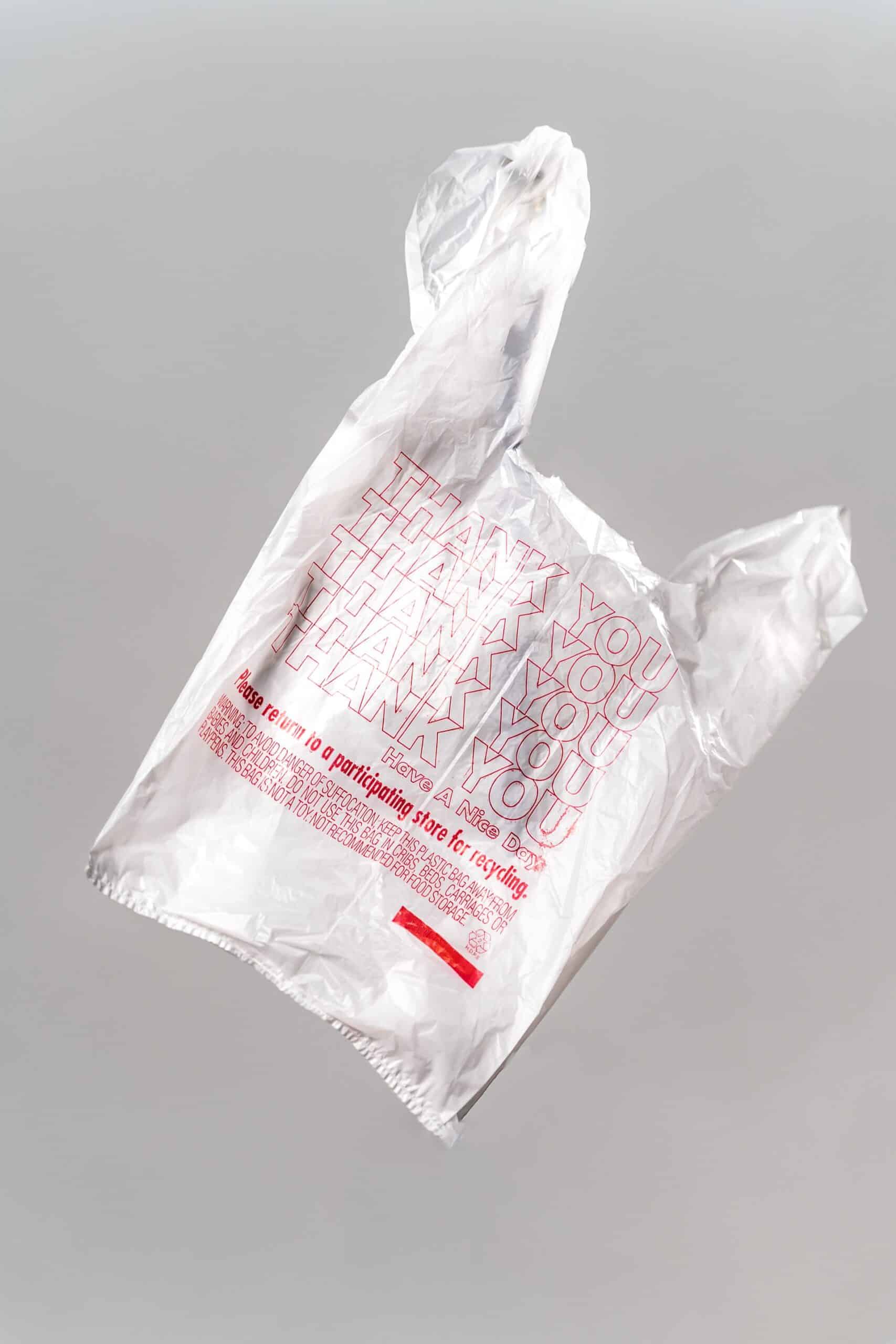 Plastic bag floating against grey background
