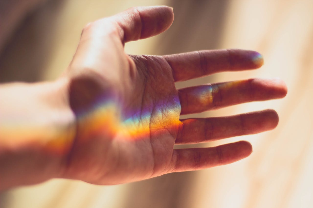 Prism reflected onto a hand.