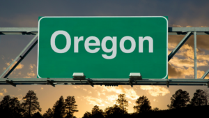 Oregon sign on highway.