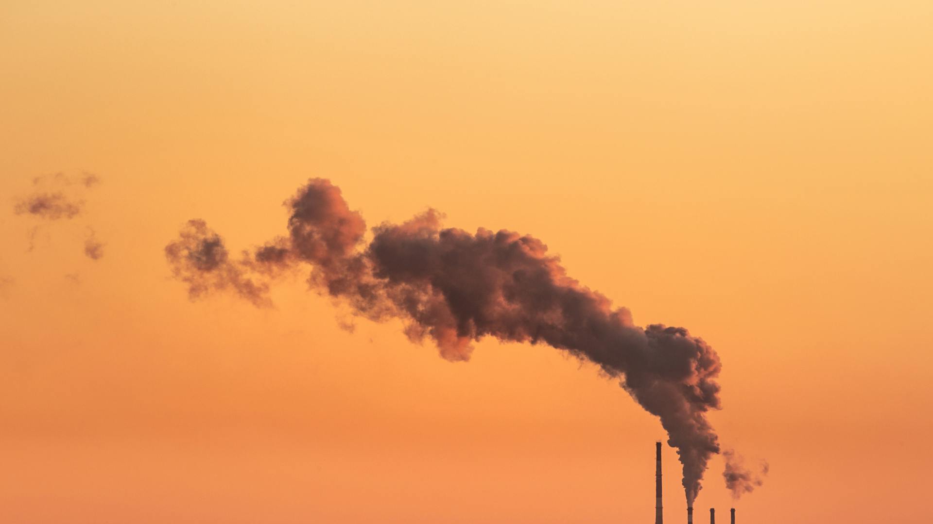 Smokestack at sunset.
