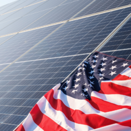 Solar panels and United States flag.