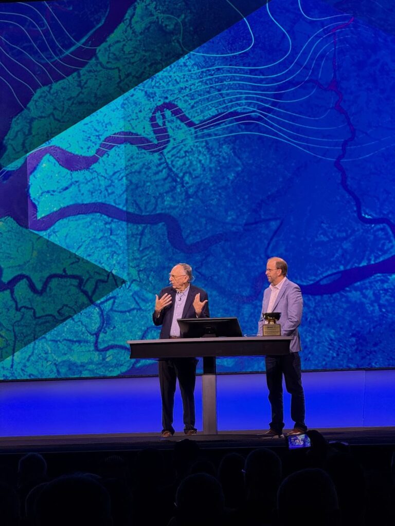 Jack Dangermond (Left) on the main stage in front of 20,000 people at the UC Plenary