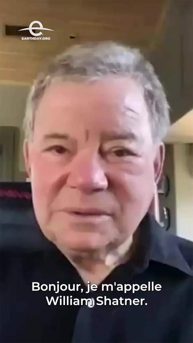 Photo of Actor William Shatner, from video of his appeal to save the whales. Text: bonjour je m'appelle Willaim Shatner.