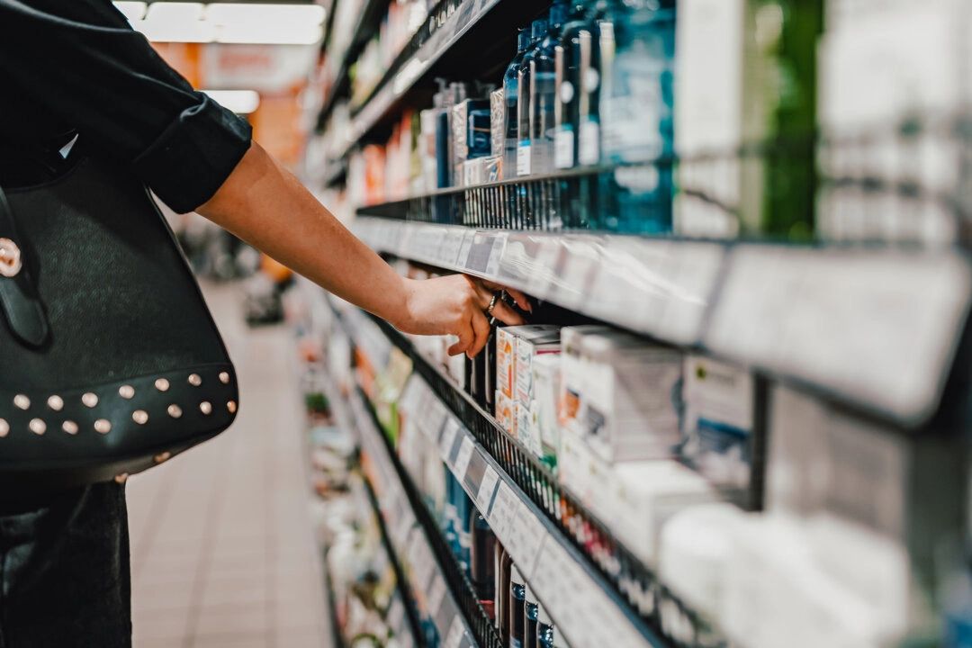photo of shopper in the beauty/hygeine product part of a store