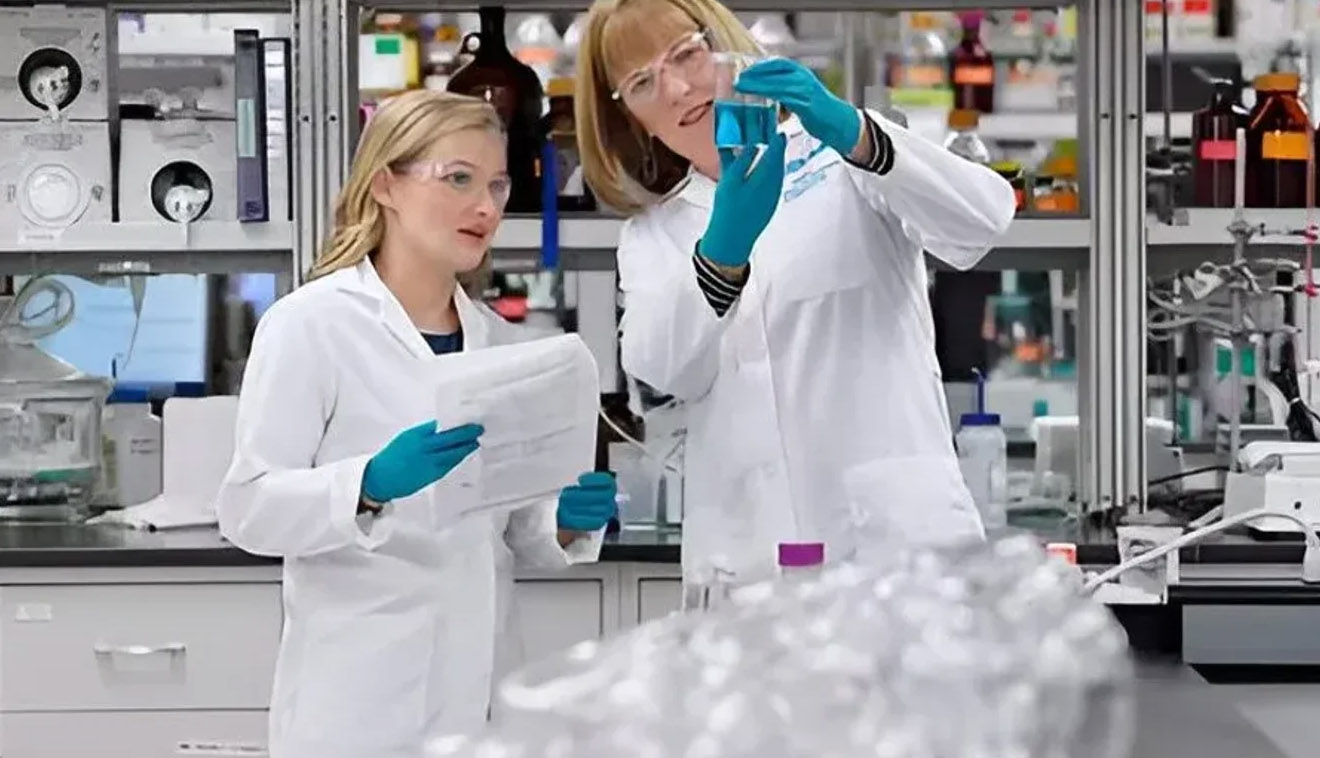 Credit: Ecolab. Ecolab is aiming to protect the Earth's resources. Image of scientists working ot resolve plastics issues.
