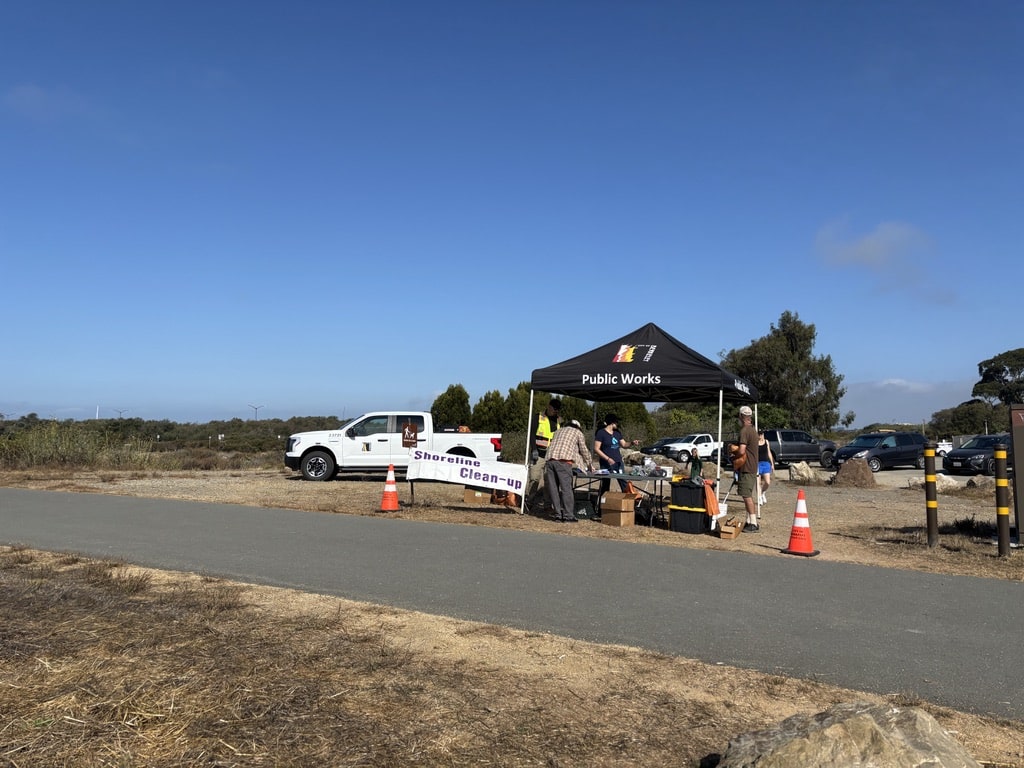 Volunteers check in at the welcome tent