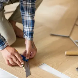 Photo: Witthaya Prasongsin/Getty Images, flooring installation in progress