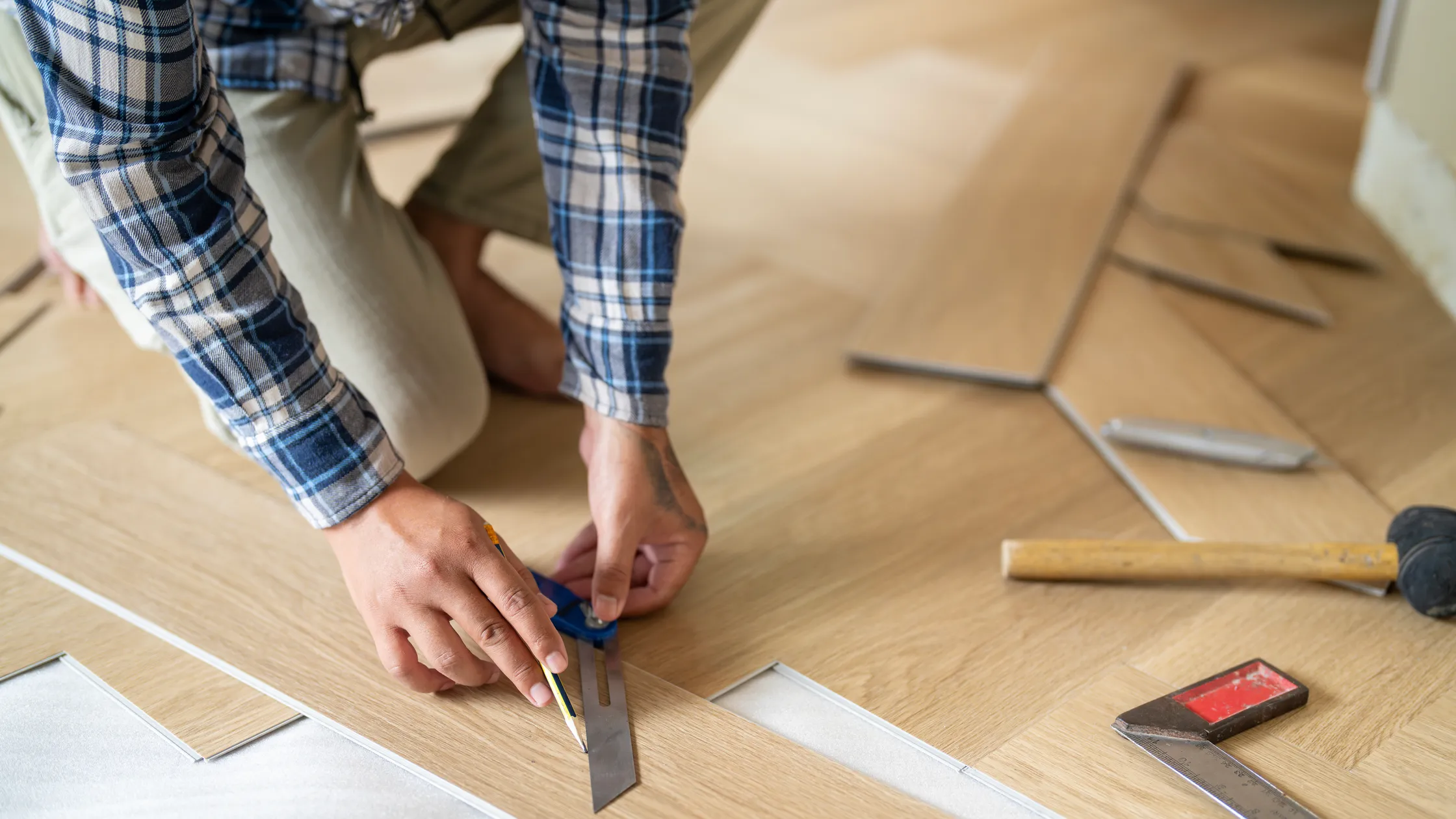 Photo: Witthaya Prasongsin/Getty Images, flooring installation in progress