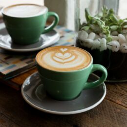 Cappuccino in a green cup