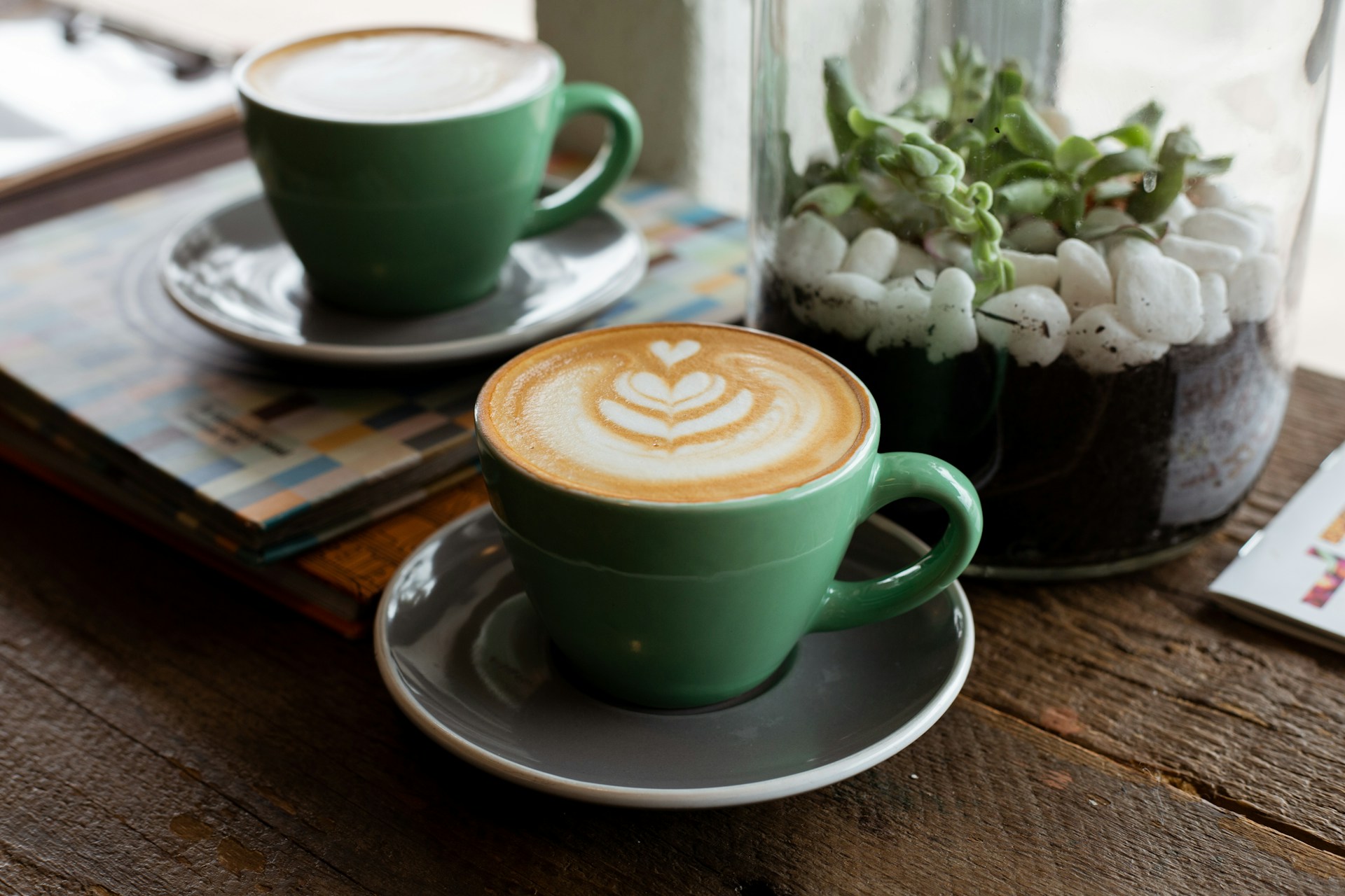 Cappuccino in a green cup