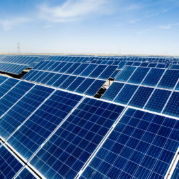 Solar panels under a blue sky
