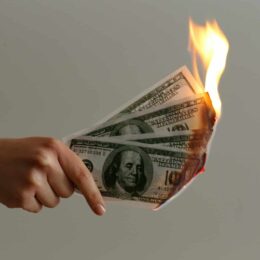 Burning $100 bills