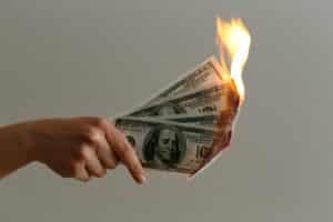 Burning $100 bills