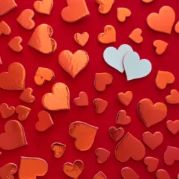 Hearts on red background