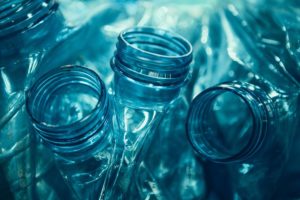 close up of tops of plastic bottles