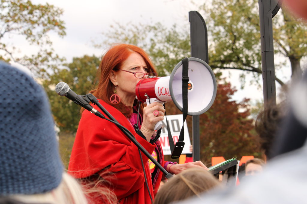 Evans talking at event